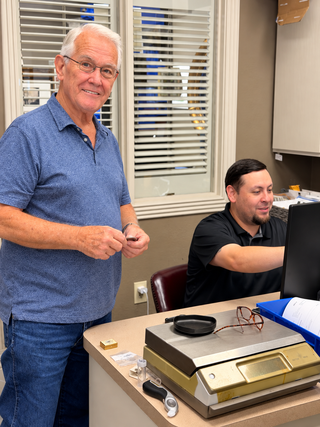 Members of the David’s Jewelry & Coin Exchange team assist customers at the College Station counter.