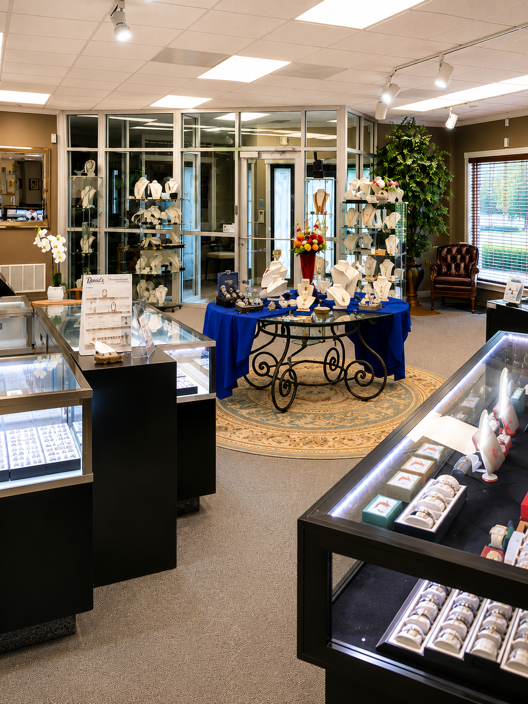 Glass jewelry display cases inside David’s Jewelry and Coin Exchange.
